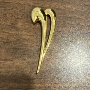 Vintage Monet brooch, gold tone. Marked Monet. Like new condition.